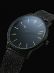 Black men watch with steel mesh strap